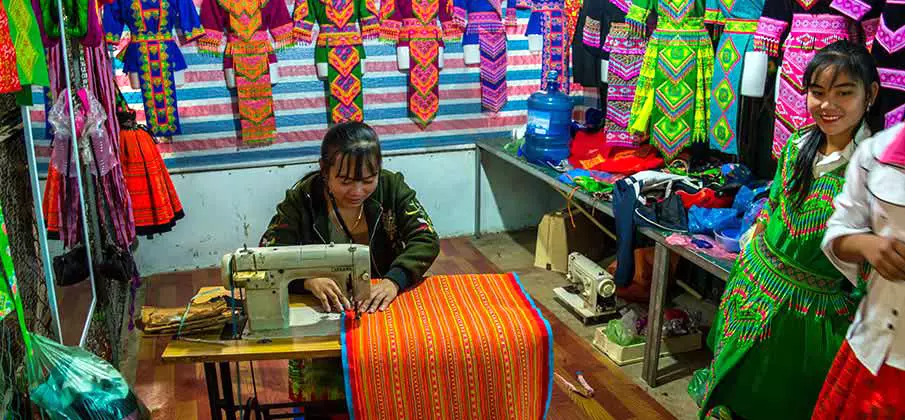 Hmong Women at Bac Yen Market, Son La Province Hmong women wearing traditional clothing at Bac Yen Market in Son La Province, northwest Vietnam