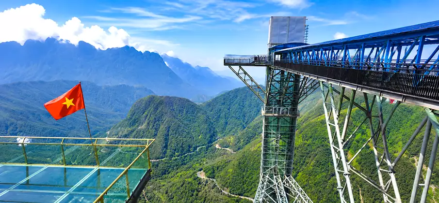 Rong May Glass Bridge overlooking the Hoang Lien Mountains on O Quy Ho Pass in Lai Chau Province, Northern Vietnam