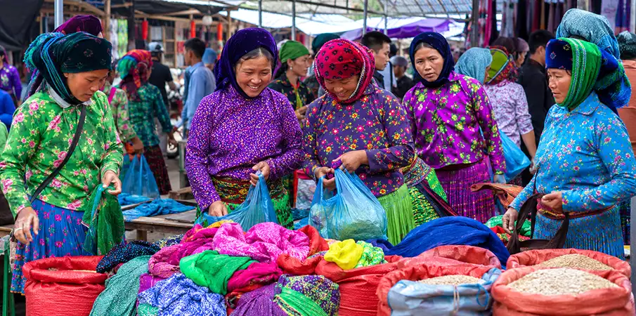 Dong Van Sunday Market in Ha Giang, Vietnam Dong Van Sunday Market with local people and colorful traditional clothing in Ha Giang, Vietnam