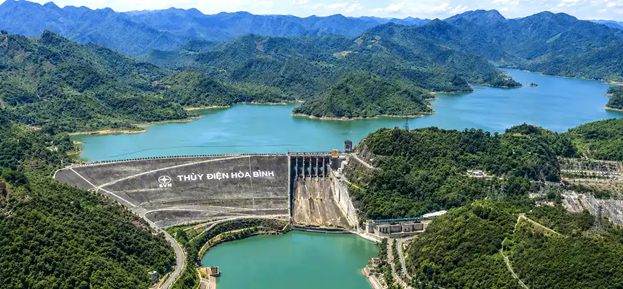 Hoa Binh Dam and Reservoir in Northern Vietnam Panoramic view of Hoa Binh Dam and the Hoa Binh Lake reservoir surrounded by mountains in northern Vietnam