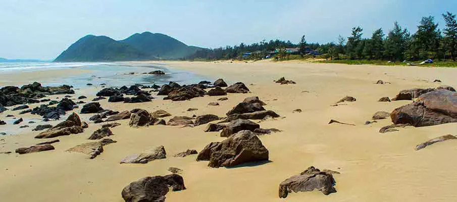 Thai Hoa Beach on Quan Lan Island, Bai Tu Long Bay Thai Hoa Beach on Quan Lan Island with white sand, turquoise water, and a peaceful coastline in Bai Tu Long Bay, Vietnam